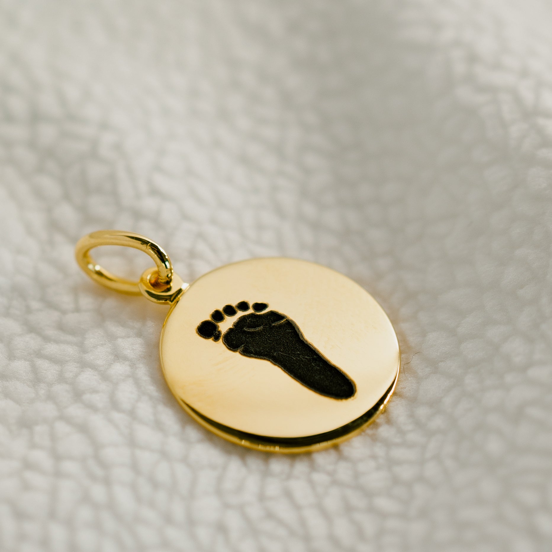 Pendentif empreinte de main et de pied