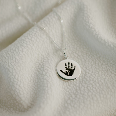 Hand and footprint pendant on a bead chain, sterling silver