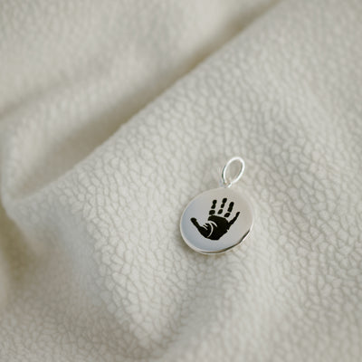 Hand and footprint pendant, sterling silver
