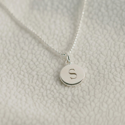Mini initial disc pendant on a box link chain, sterling silver